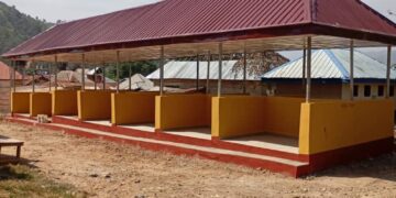 Chief Martin Orim facilitates market construction in Obanliku.